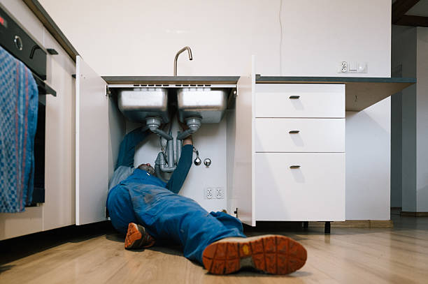 Professional Emergency Plumber technician working in Cummaquid, MA